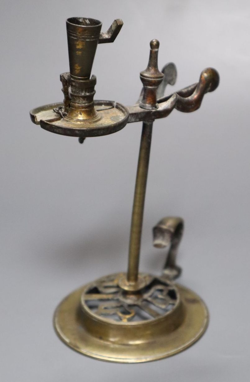 A 19th century brass waxjack, with attached extinguisher, 14cm high
